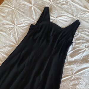 H&M black dress Classic flattering fit zipper back. Mesh detailing size 8
